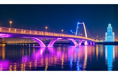 Al Noor Island's bridge at night seen from the water